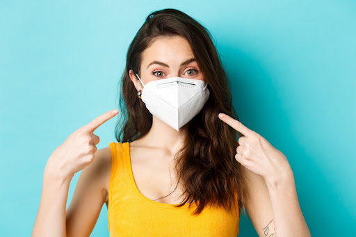 Woman wearing a mask to prevent cold