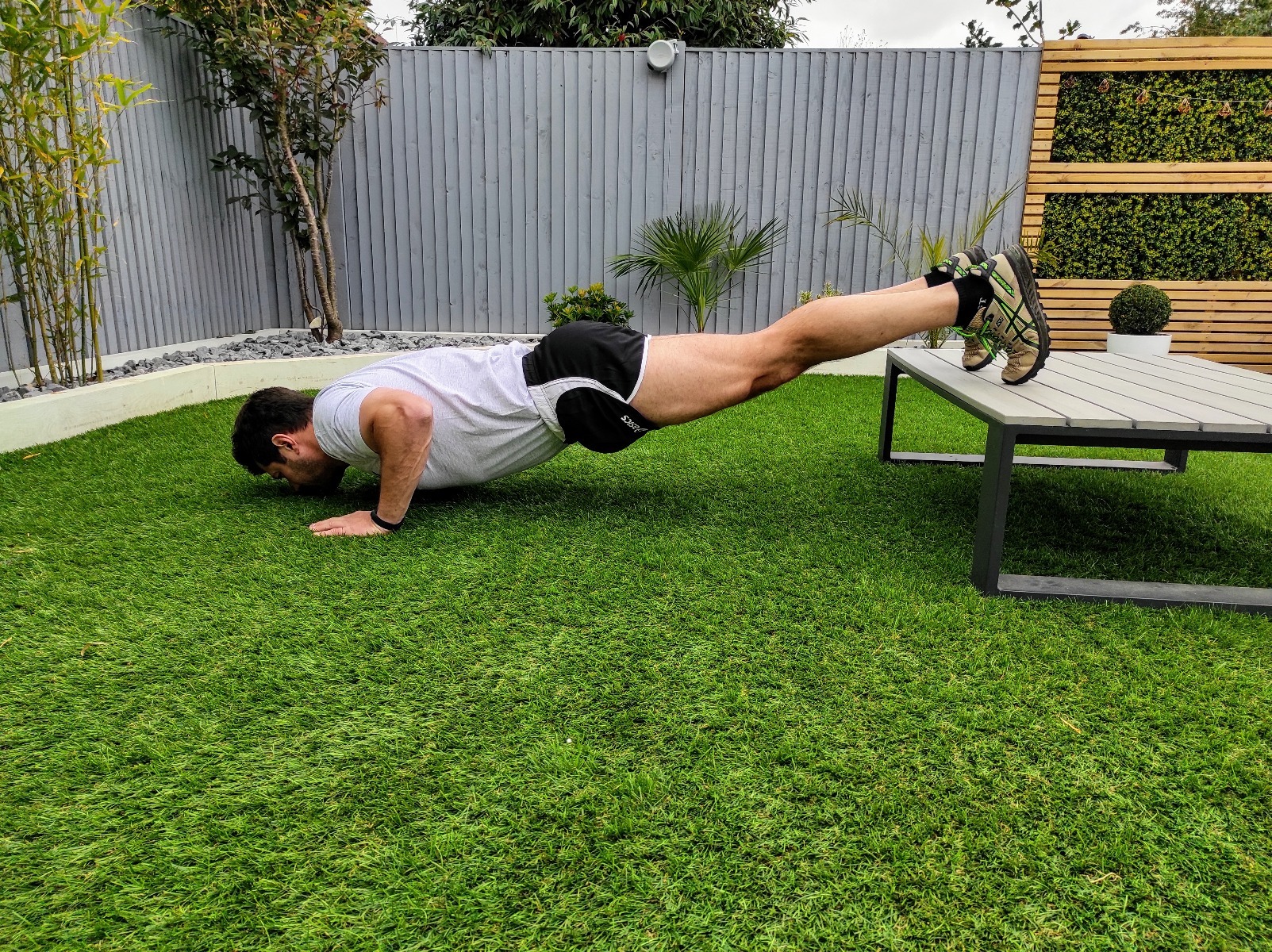 Build Healthy Bones: Man doing military presses